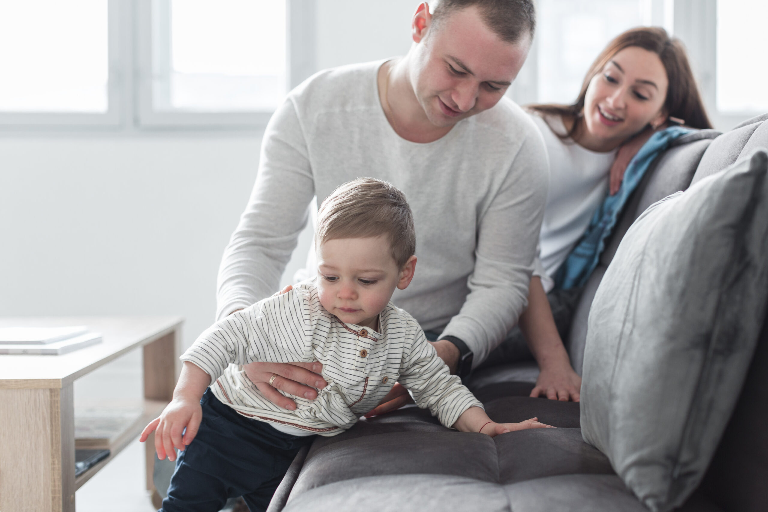 family-playing-couch